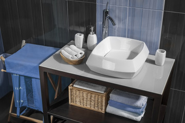 detail of a contemporary bathroom with sink and accessories