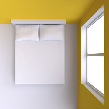 Bed with pillows and  in the corner room with window.