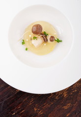 Fine dining, mushroom Porcini soup in a gourmet restaurant