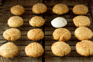Shortbread cookies and meringue on wire rack