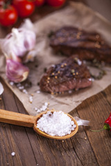 Grilled meat on wooden table