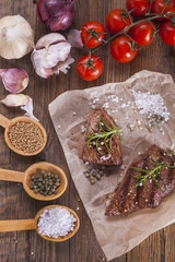 Grilled meat on wooden table