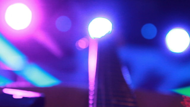 rock concert:  backstage - guitar in the Stage Lighting