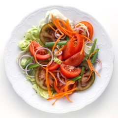 Salad with carrots, tomatoes and onions