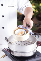 Chef presented steam mince pork and saly red egg Dim Sum