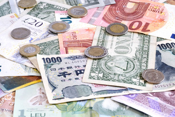 Money from different countries closeup with euro coins