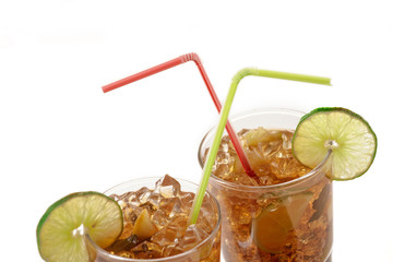 Fresh Fresh cocktail with cola drink and lime fruit