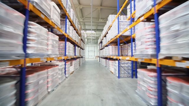 Goods lay on shelves in warehouse of factory