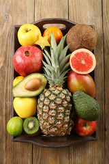 Assortment of fruits on wooden table