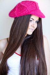 Beautiful smiling woman in pink beret