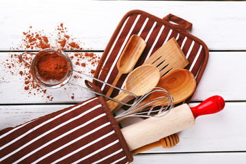 Set of kitchen utensils with cocoa in mitten