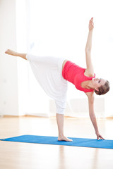 Fototapeta na wymiar Yoga woman indoors
