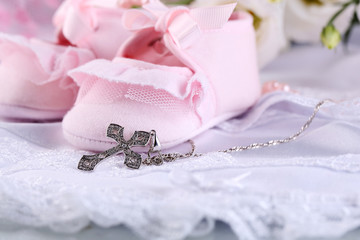 Baby shoe and cross for Christening