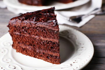 Delicious chocolate cake in white plate