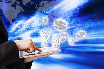 Business woman are checking exchange rates by using digital tabl