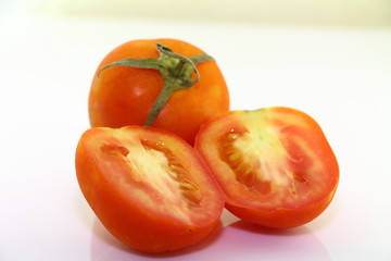 Red tomatoes, sweet, with a lot in making a juice and vitamins.