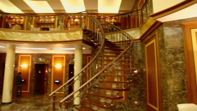 Few chairs at hall with stairs in Federation Tower of Moscow City