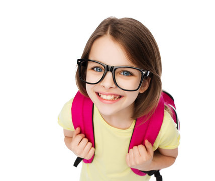 happy smiling teenage girl in eyeglasses with bag