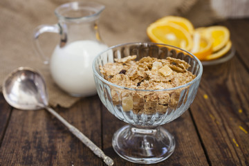 muesli with yogurt and oranges