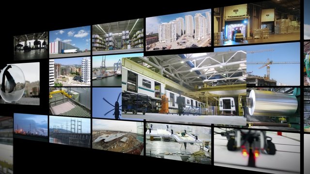 Lots of screens with videoclips with industrial images collage