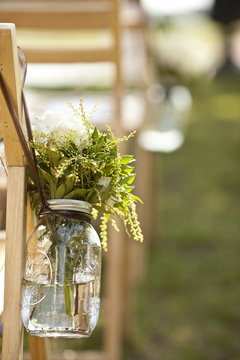 bouquet in jar at wedding