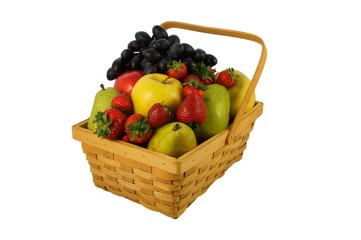 Wicker basket with fruits isolated on white.