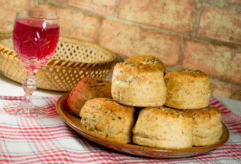 Round salt cakes with glass of wine
