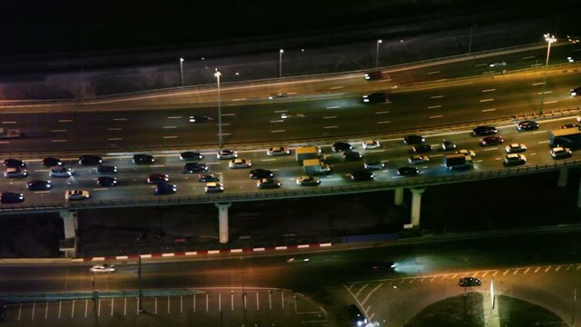 Traffic on multilevel road, view from City at night