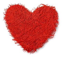 Love. Heart made of red wool yarn isolated on white