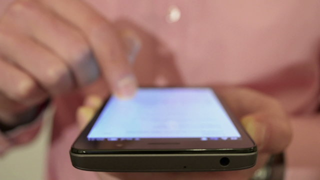 Man Using a Smartphone, close up