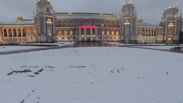 Illuminated royal palace in Tsaritsyno at winter evening