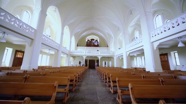 Rows of benches and organ in Evangelical Lutheran Cathedral