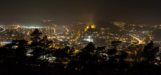 marburg germany at night as an panoramic view - obrazy, fototapety, plakaty