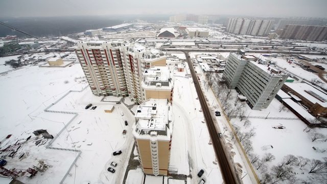 Cityscape of new residential district in winter, view from above