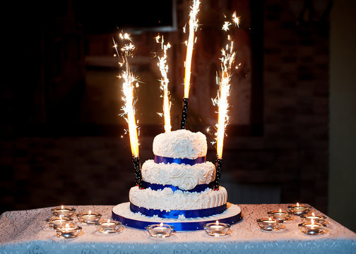 Beautiful Three-layered Wedding Cake With Fireworks