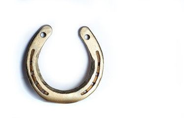 golden horseshoe isolated on white