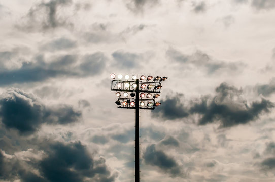 Stadium Lights Turn On At Twilight Time