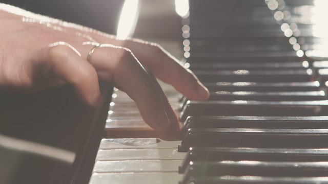 Young Woman Playing Piano