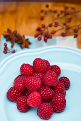 Raspberry on blue plate