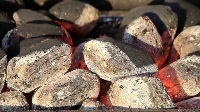 glow briquettes, charcoal, ready for barbecue grill