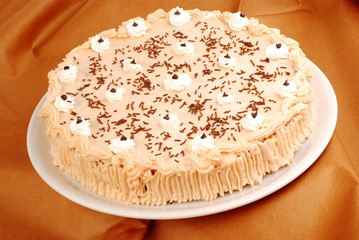 Cake with whipped cream and chocolat