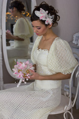 the bride in a white dress with a bouquet