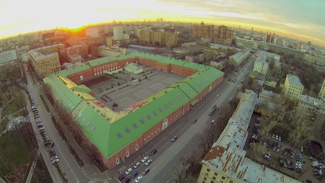 Cityscape near edifice of military commandant regiment