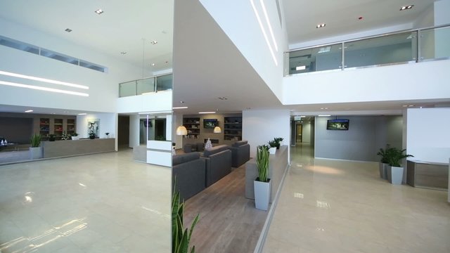 Spacious lighting empty reception hall in modern building 