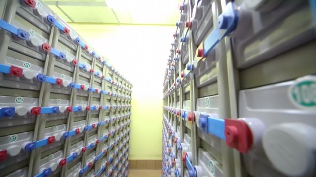 Racks with accumulator batteries of backup power system 