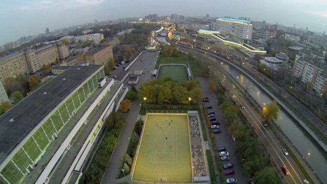 Traffic on quay of Yauza river near sports complex 
