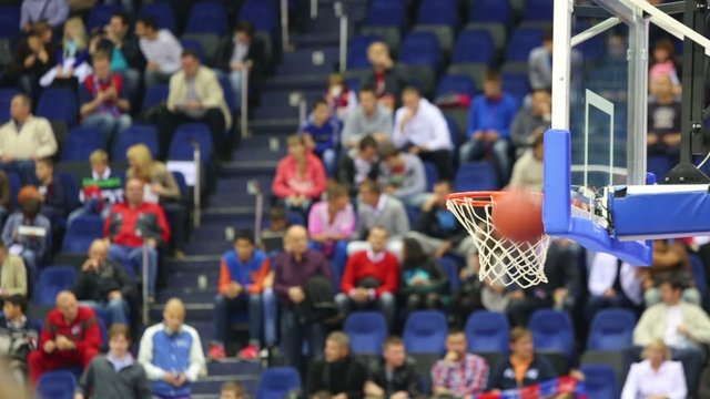 Balls fly into the basket during a basketball workout athletes