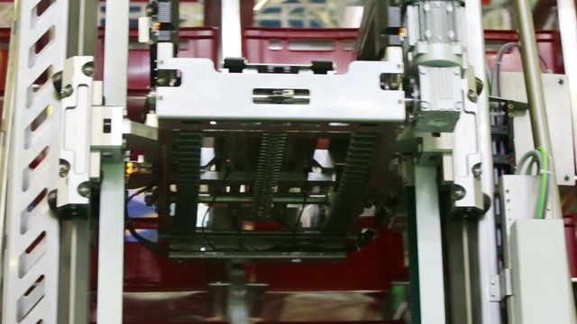 Close up of working mechanical lift for shifting boxes