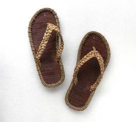 Handmade sandles on white background step