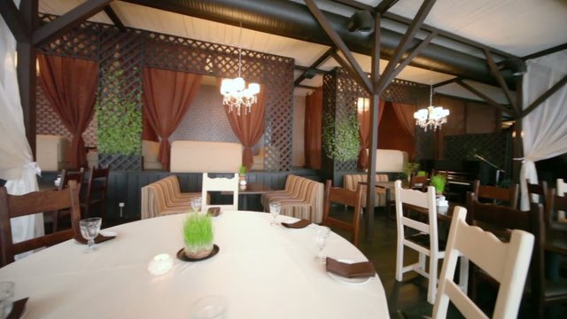 Empty cozy restaurant with interesting design, (around motion)